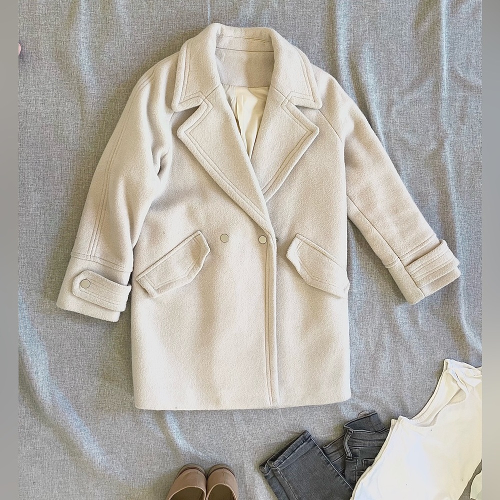 Cream colored wool peacoat